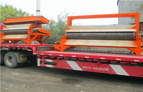 強磁輥式磁選機，上海濕式輥式磁選機工作原理_上海濕式輥式磁選機工作原理如何配置，選三氧化二鐵嗎？